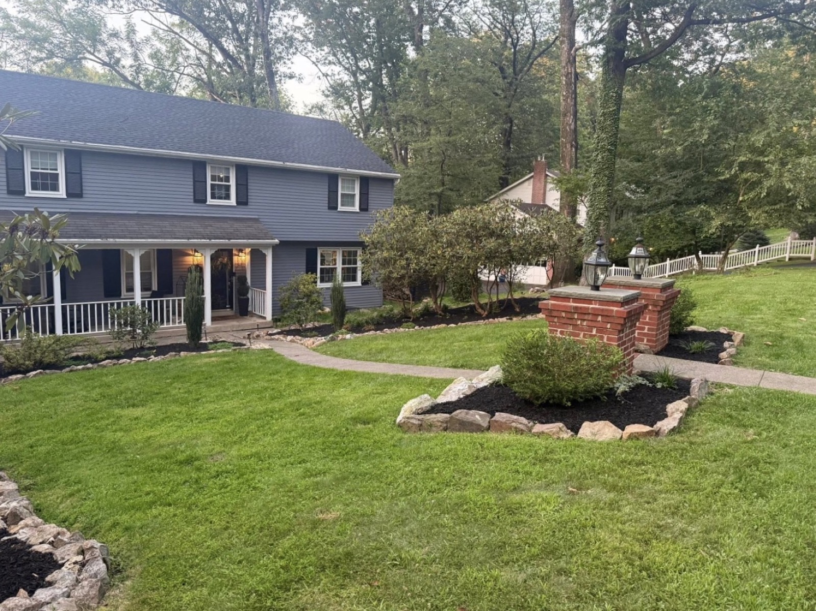 A beautifully landscaped home maintained by T-Rohn's Lawncare and Landscape