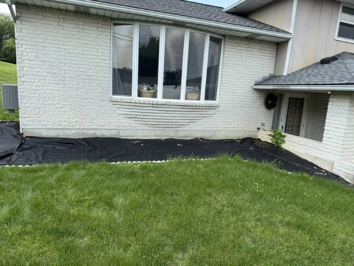 Bare foundation bed before landscaping