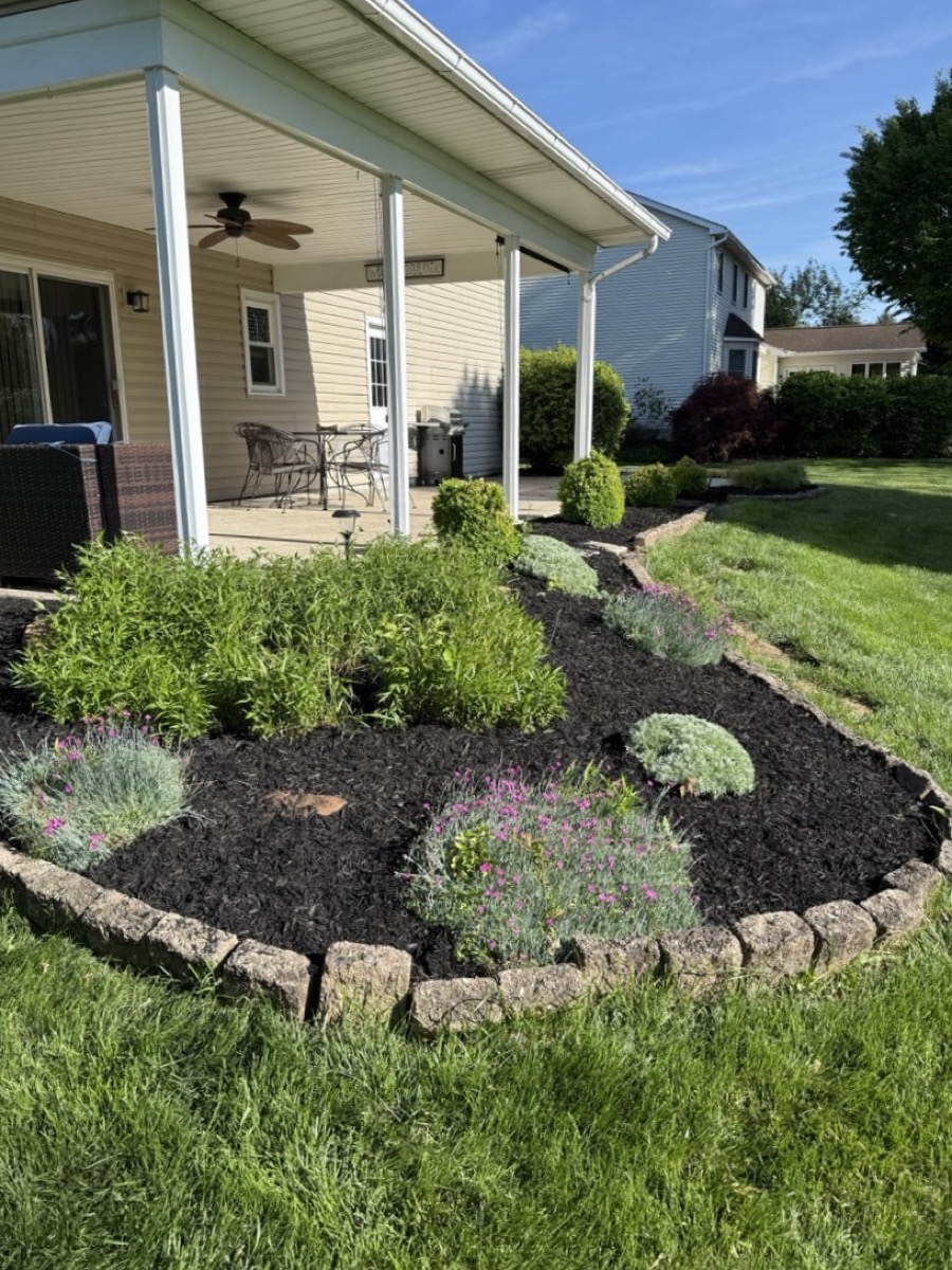 Landscaped patio flower bed
